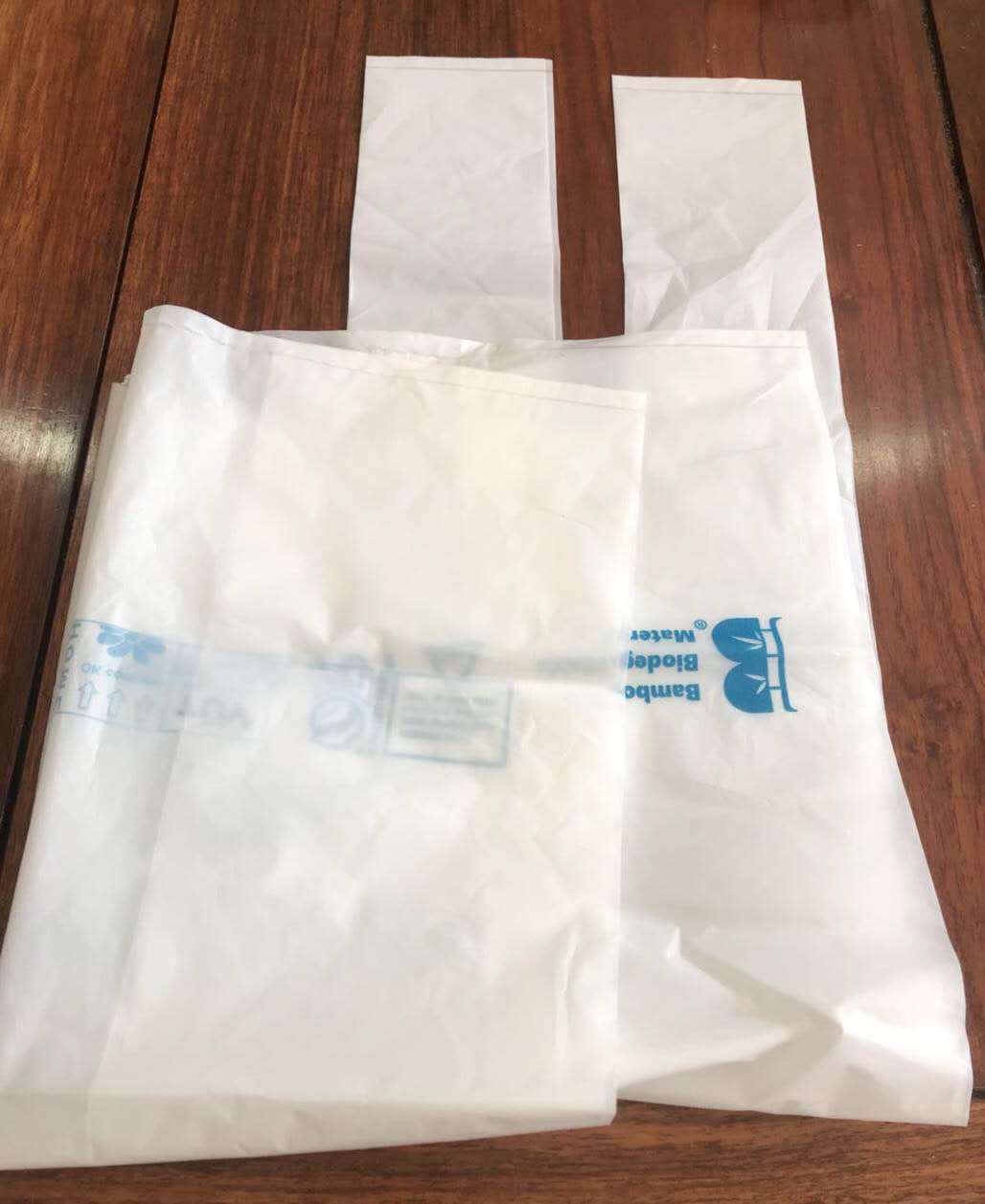 PE Corn starch film blowing material PE starch film blowing material vest bag Bin bag plastic raw material