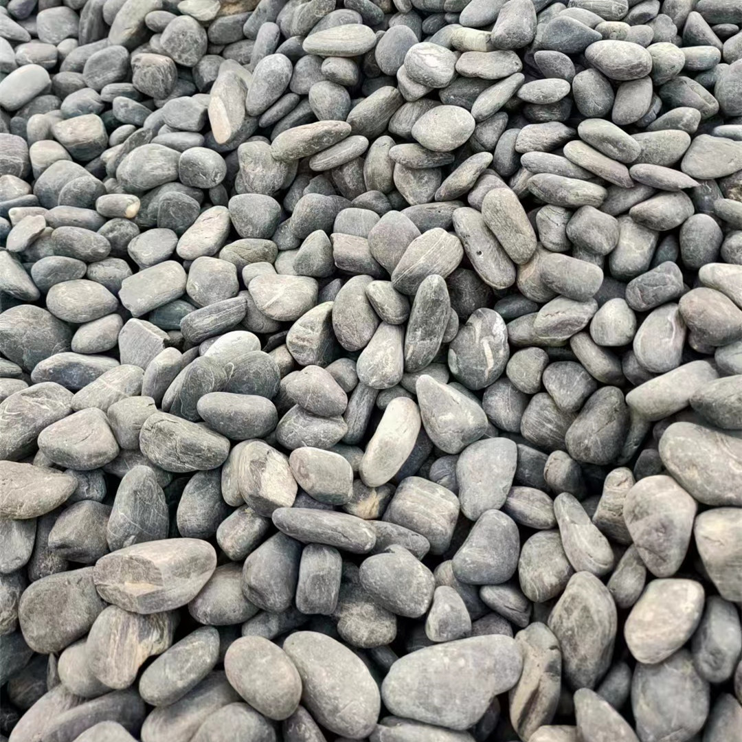 现货园林工程黑色鹅卵石 铺路造景景观黑色原石 机制黑色水洗石
